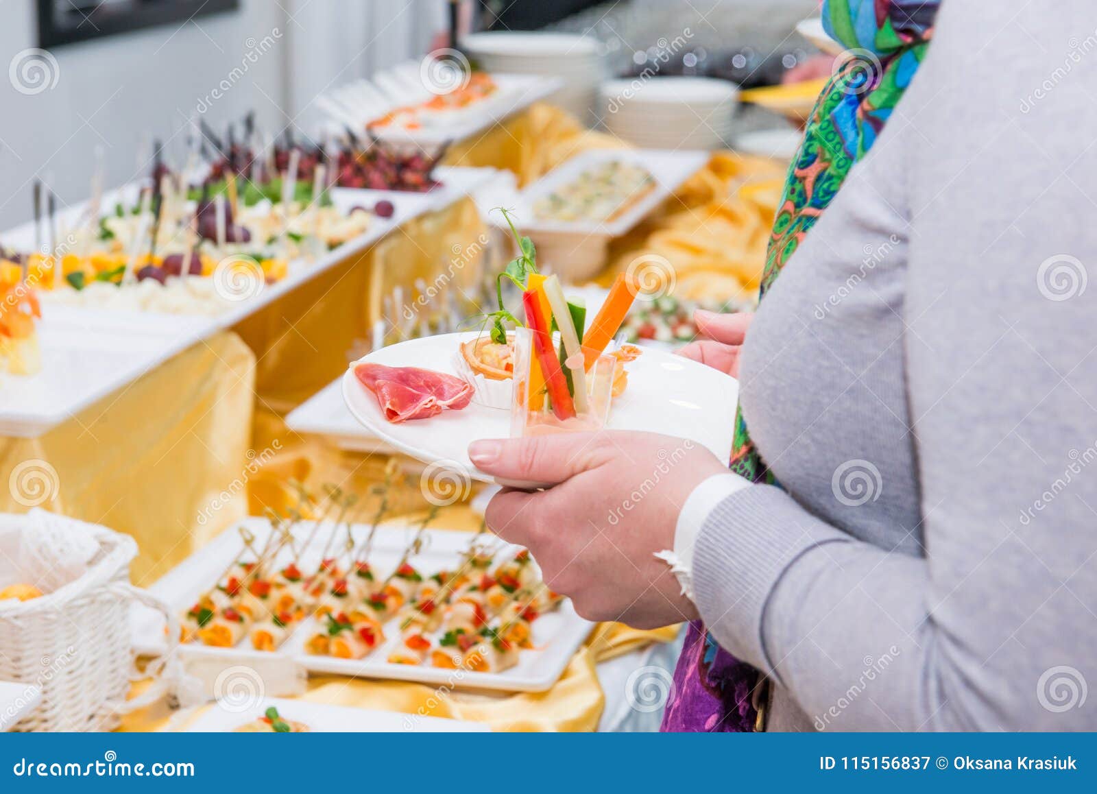 Catering Buffet Table with Food and Snacks for Guests of the Event