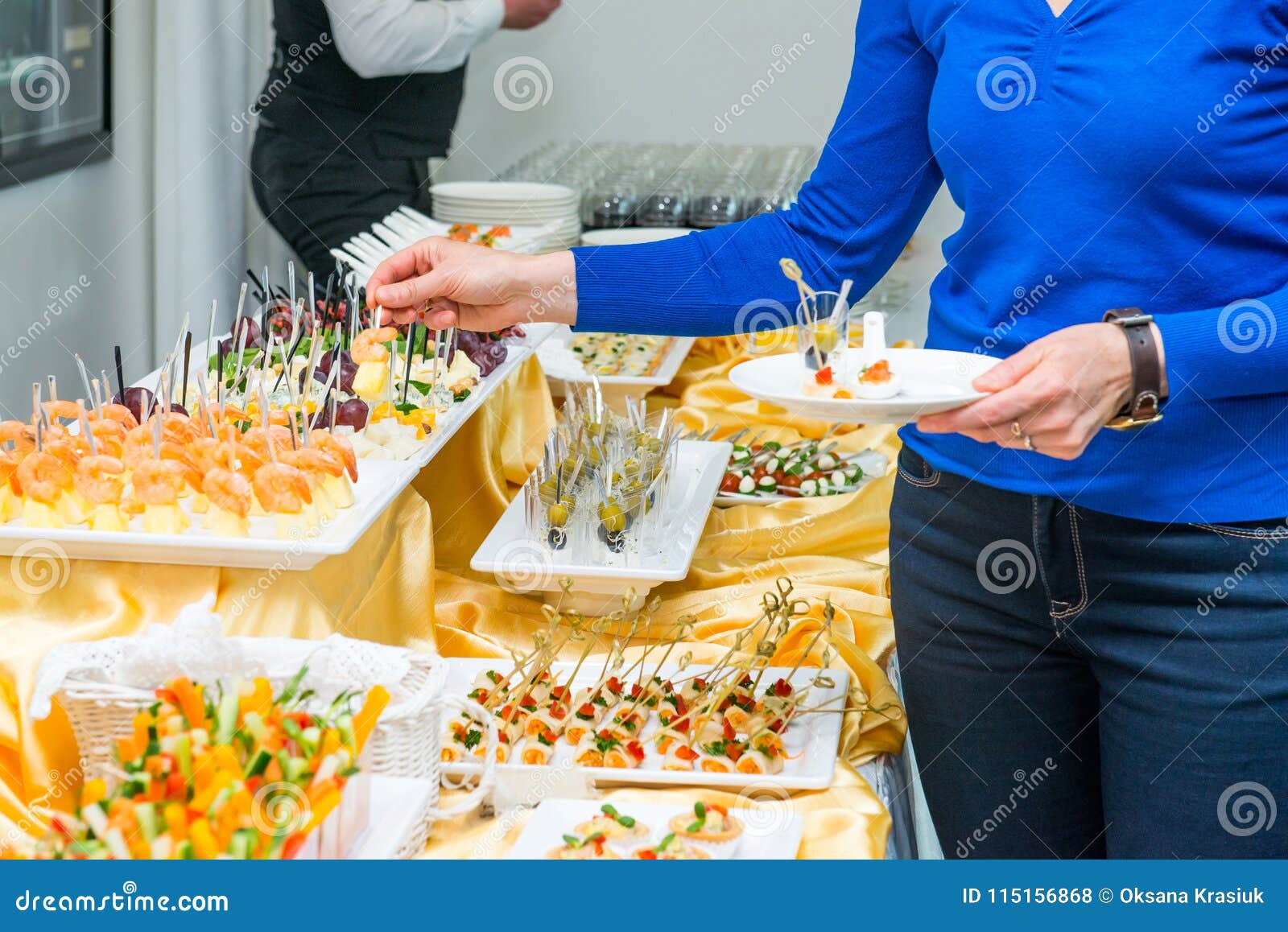 Catering Buffet Table with Food and Snacks for Guests of the Event