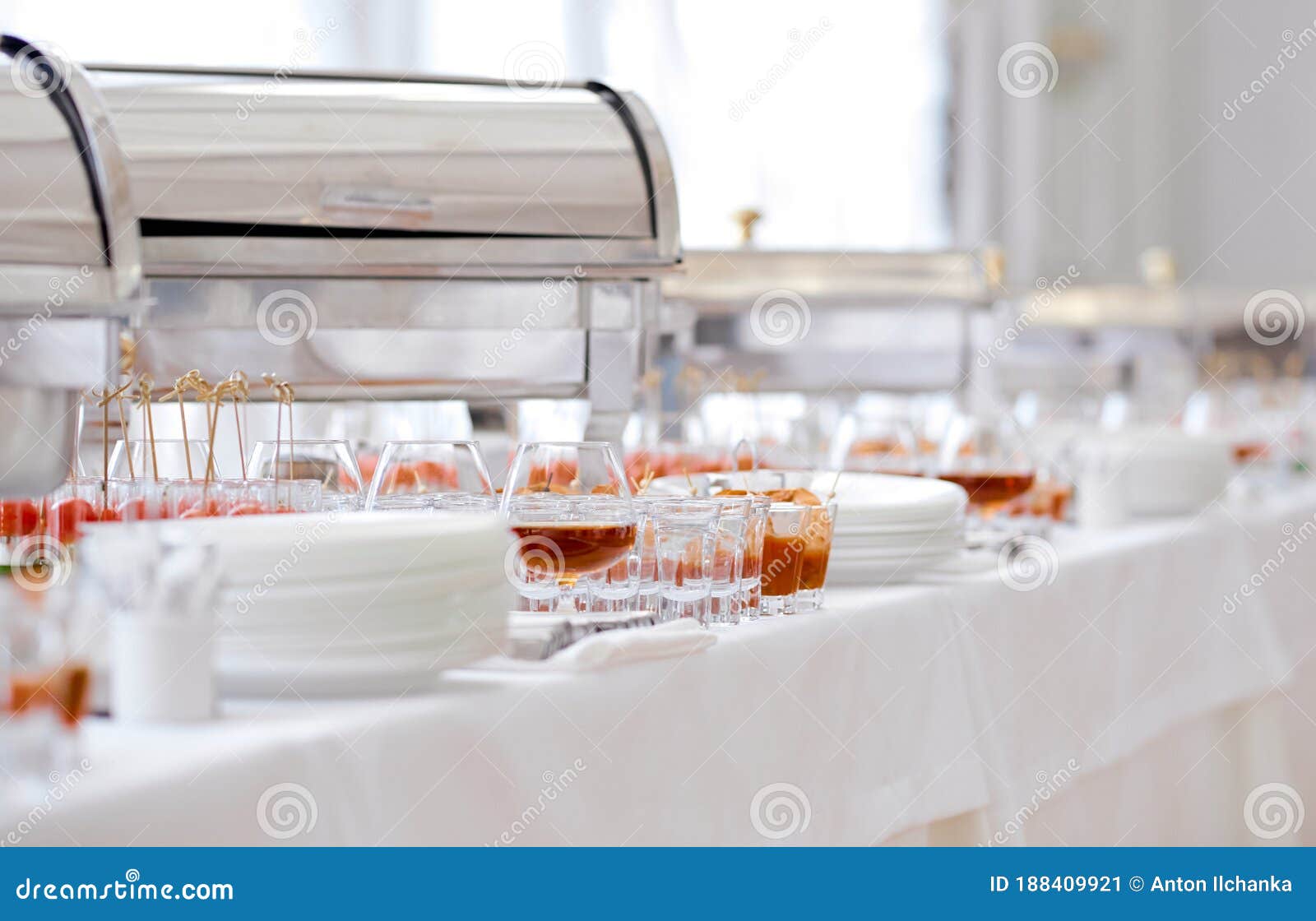 catering food on table glasses and plates