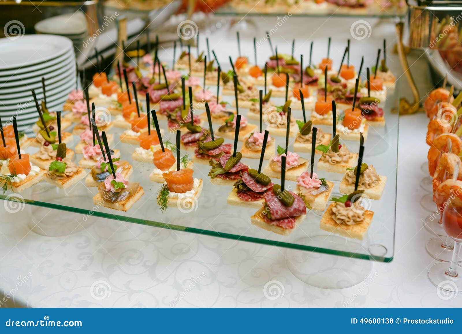 Catering - Served Table With Various Snacks, Canape And Catering - Served Table With Various Snacks, Canape And
