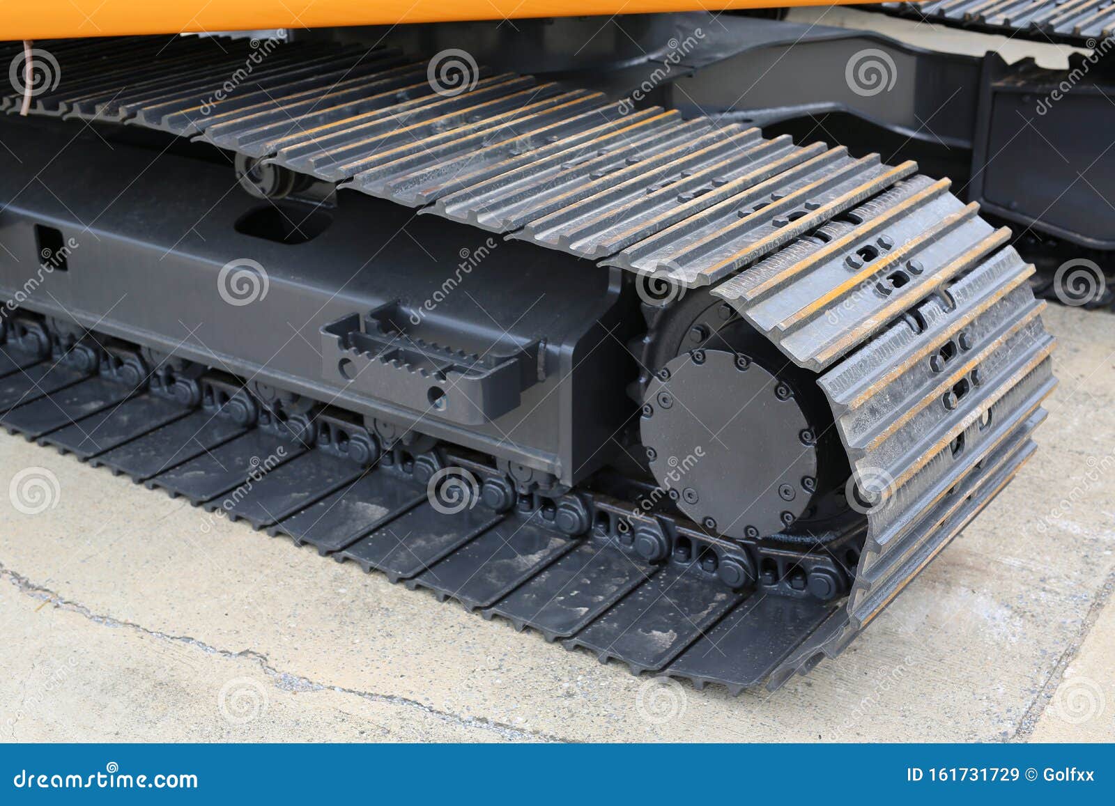 Caterpillar Wheel of Yellow Tracktype Loader Excavator Stock Image