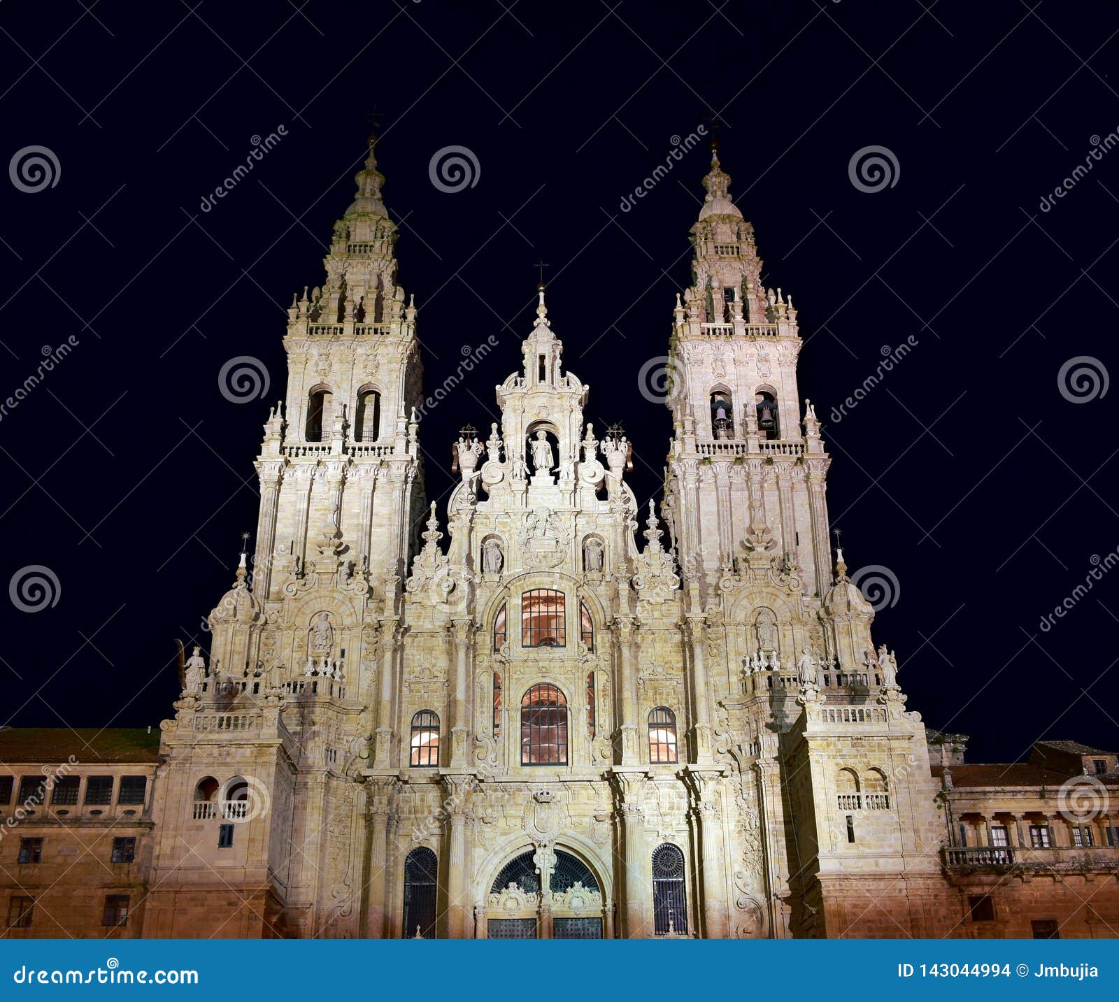 cathedral at night, baroque facade and towers. santiago de compostela, plaza del obradoiro. spain.