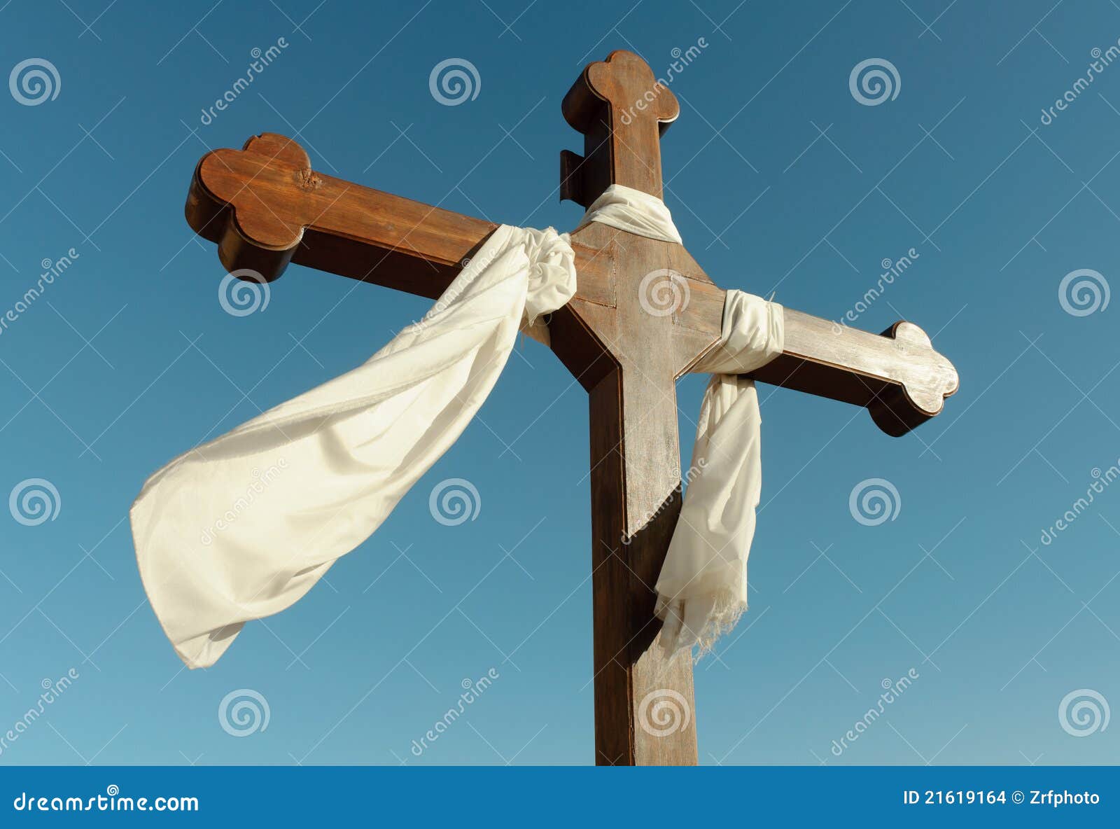 catholic cross and white fabric