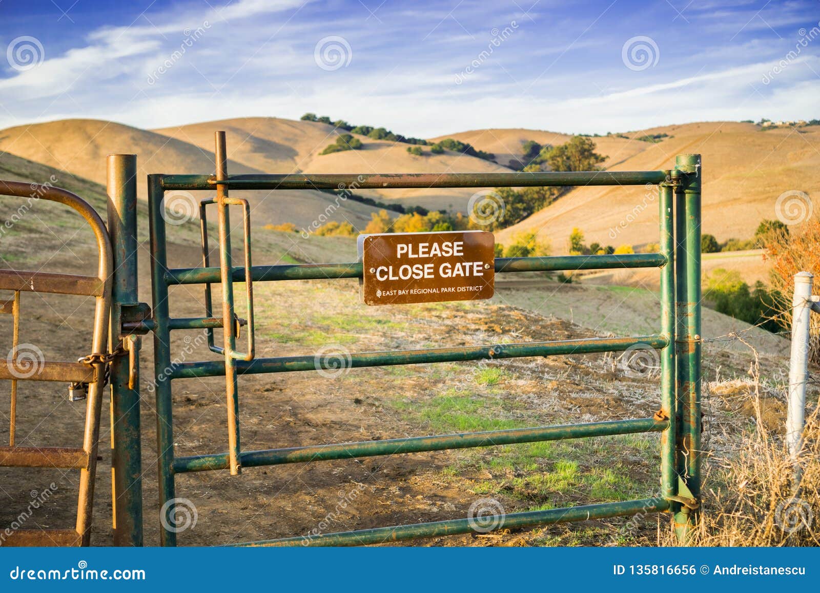 cattle gate on one of the hiking trails in garin dry creek pioneer regional park in east san francisco bay, california