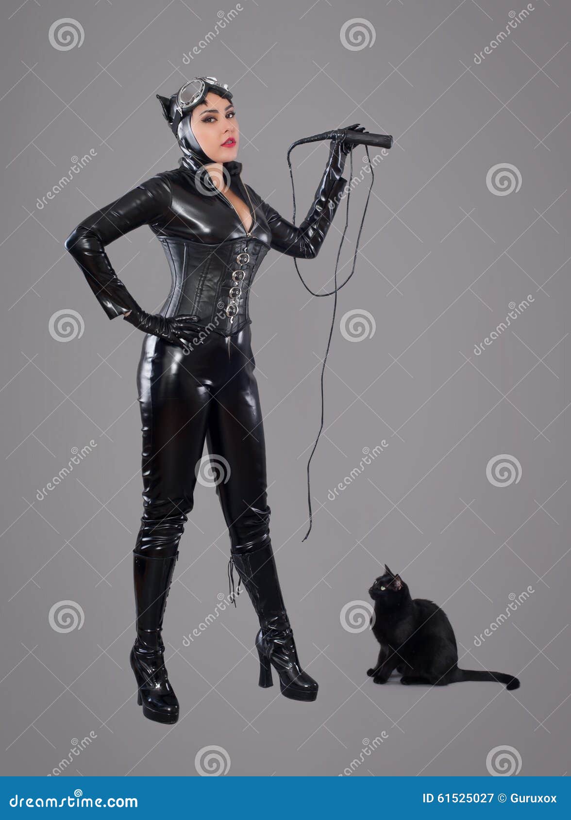 Woman in latex clothes with a whip in her hands. - Stock Photo [54971698] -  PIXTA
