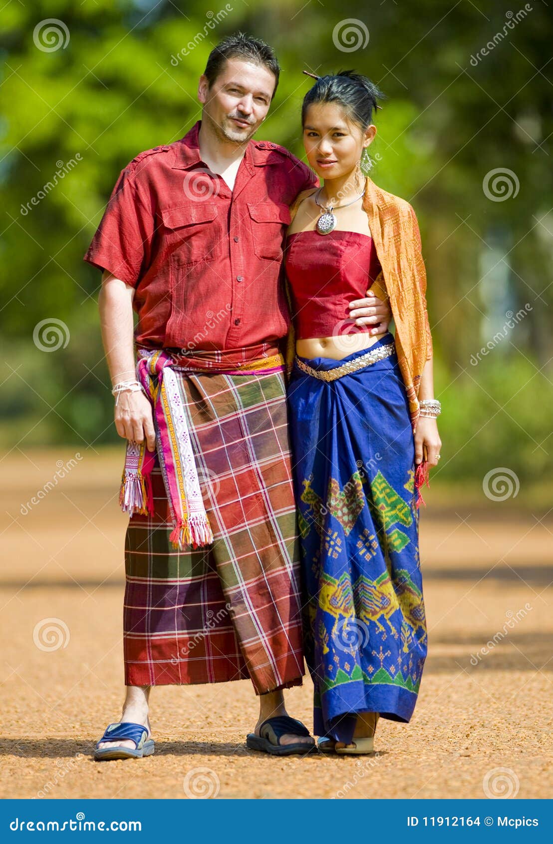 Caucasian And Asian With Traditional Thai Clothes Stock Images - Image