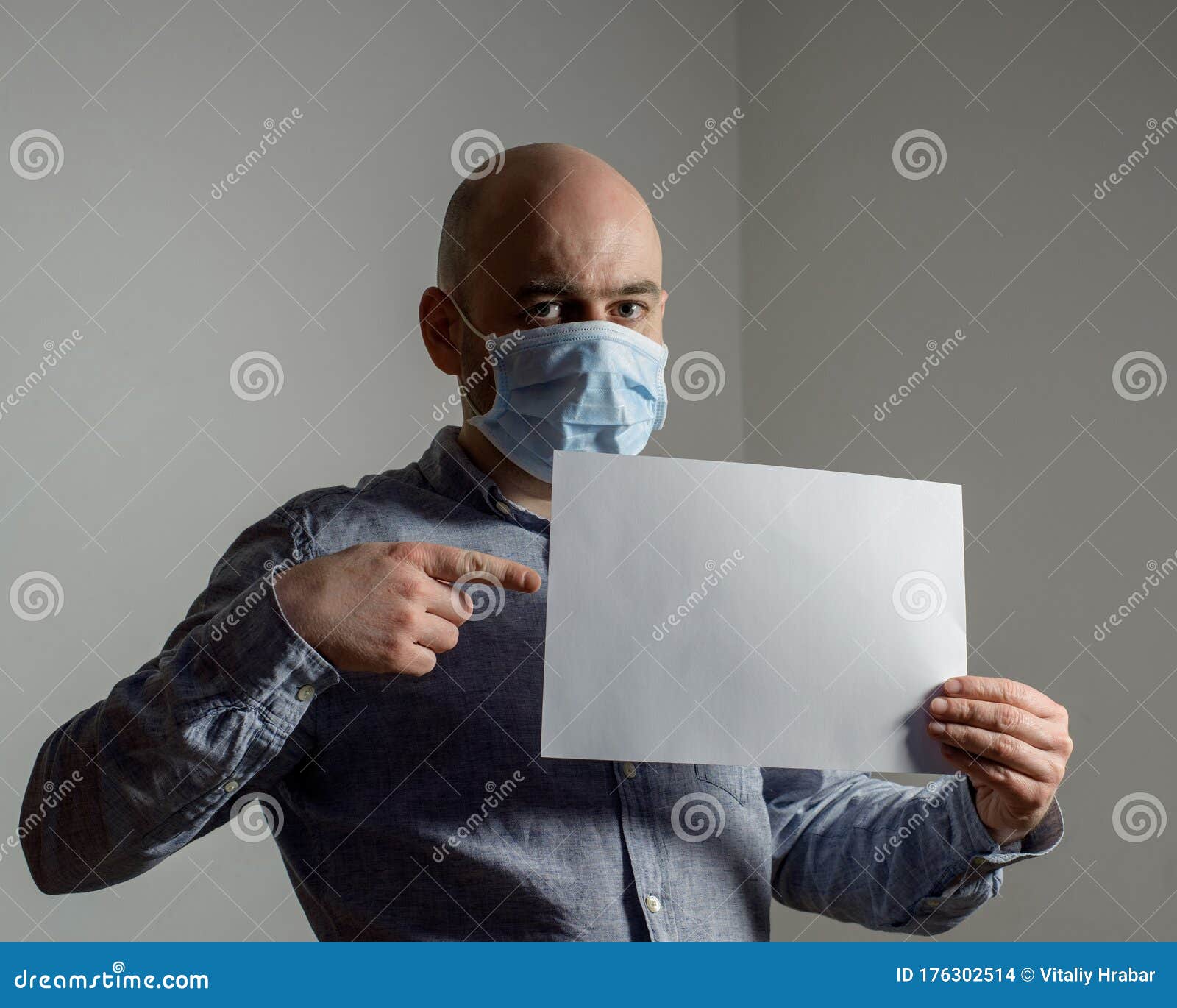 Download Man In Protective Face Mask With White Blank Sheet Poster ...