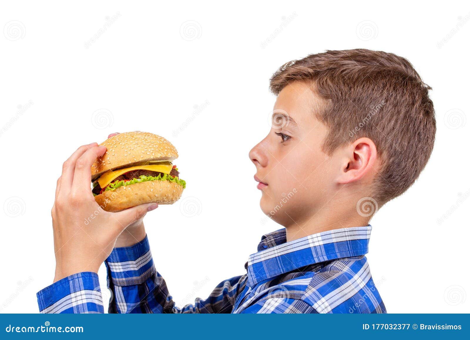 Caucasian Boy Eating Burger And Hamburger On White Background, Isolated