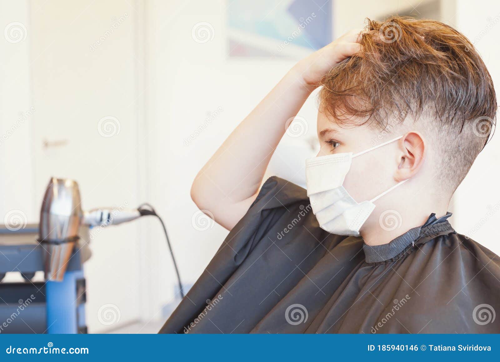 Caucasian Boy Getting Hair Cut at the Barbershop Wearing Mask. New Normal  Stock Photo - Image of face, pandemic: 185940146