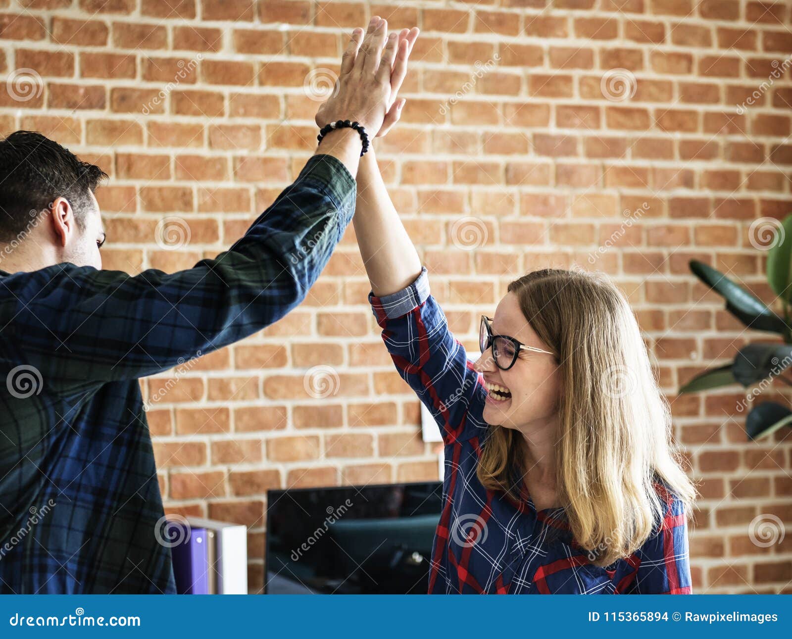 Caucasian Colleagues Give Each Other High Five Stock Photo - Image of