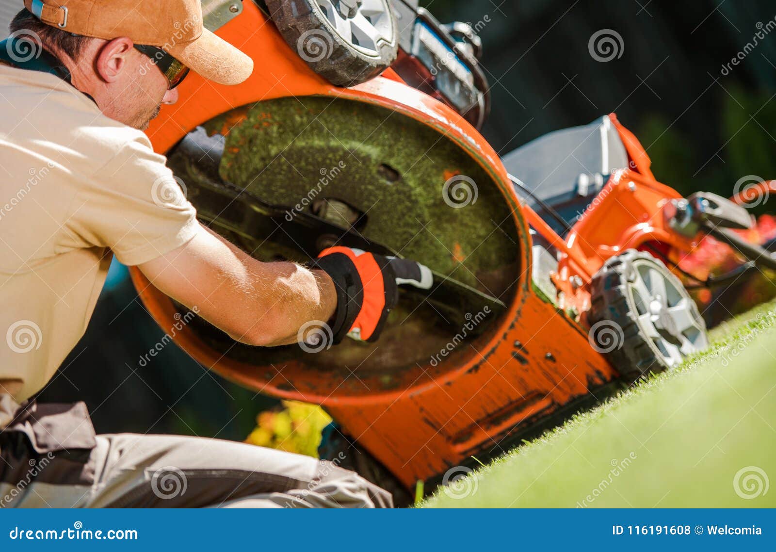 checking lawn mower blades