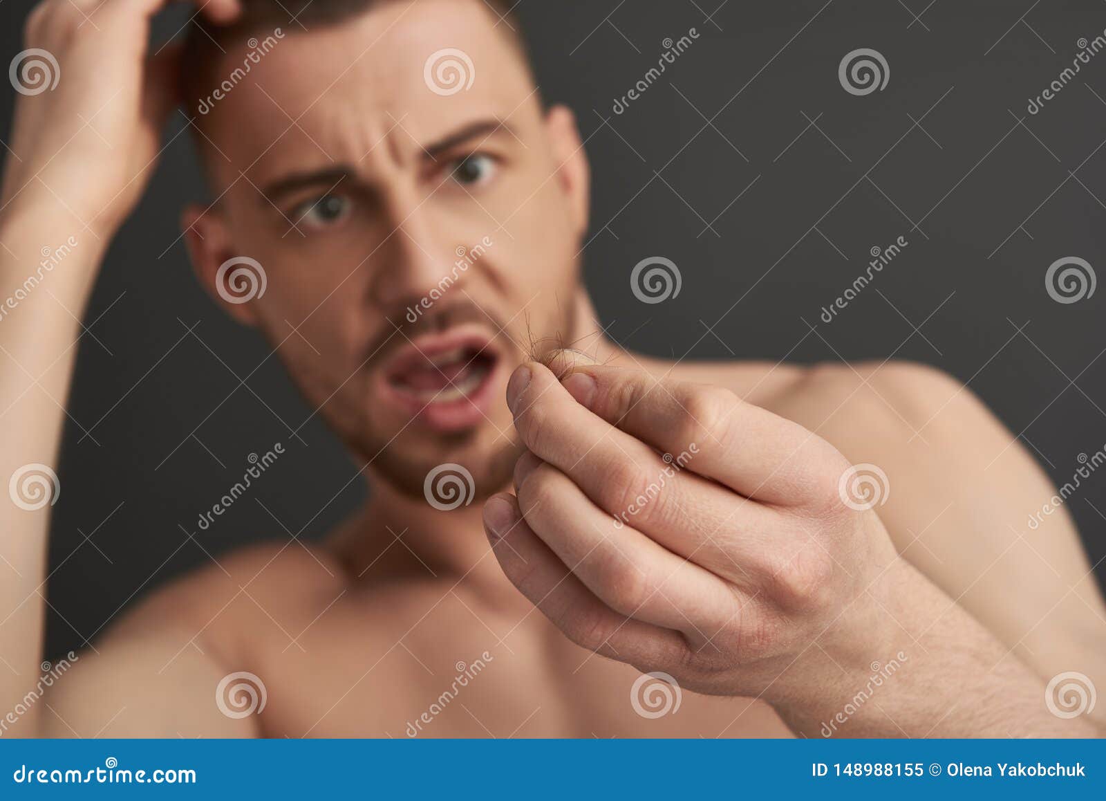 Caucasian Guy Keeping Hair Loss in Arm and Looking at it Stock Image -  Image of clear, morning: 148988155
