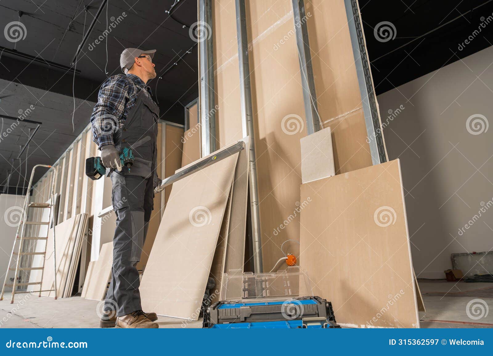 interior finishing general contractor with a power tool