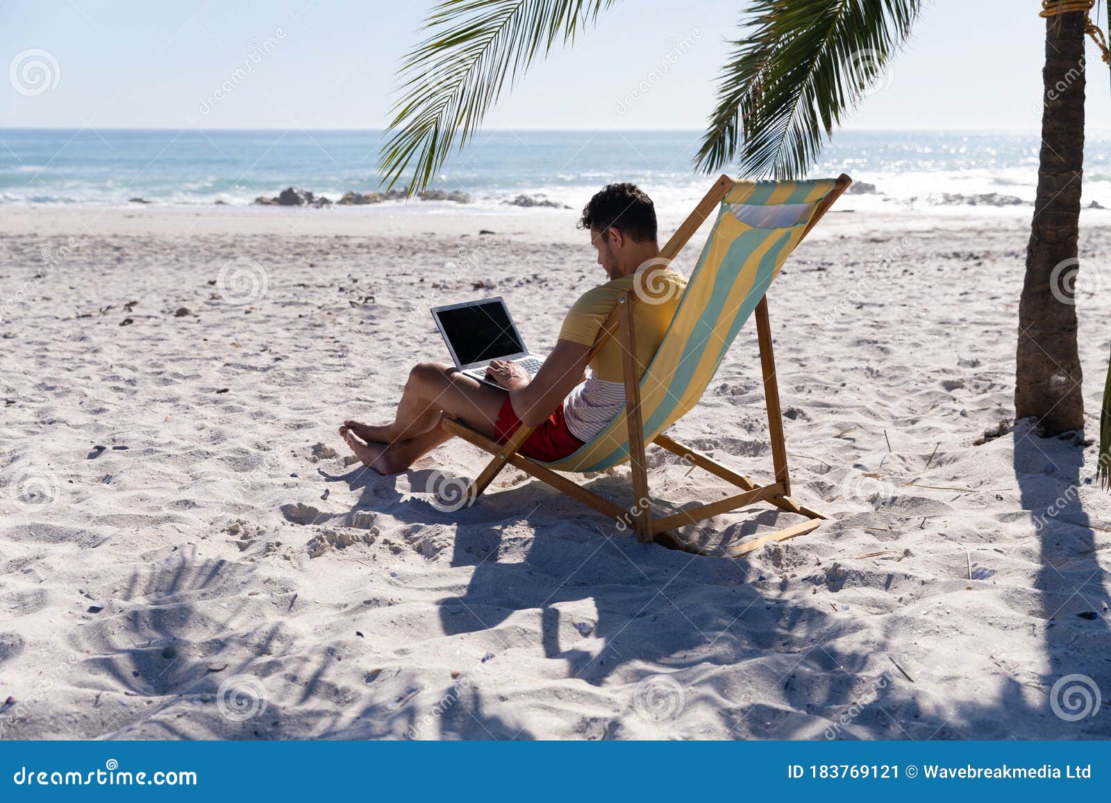 Minimalist Man Sitting On Beach Chair 