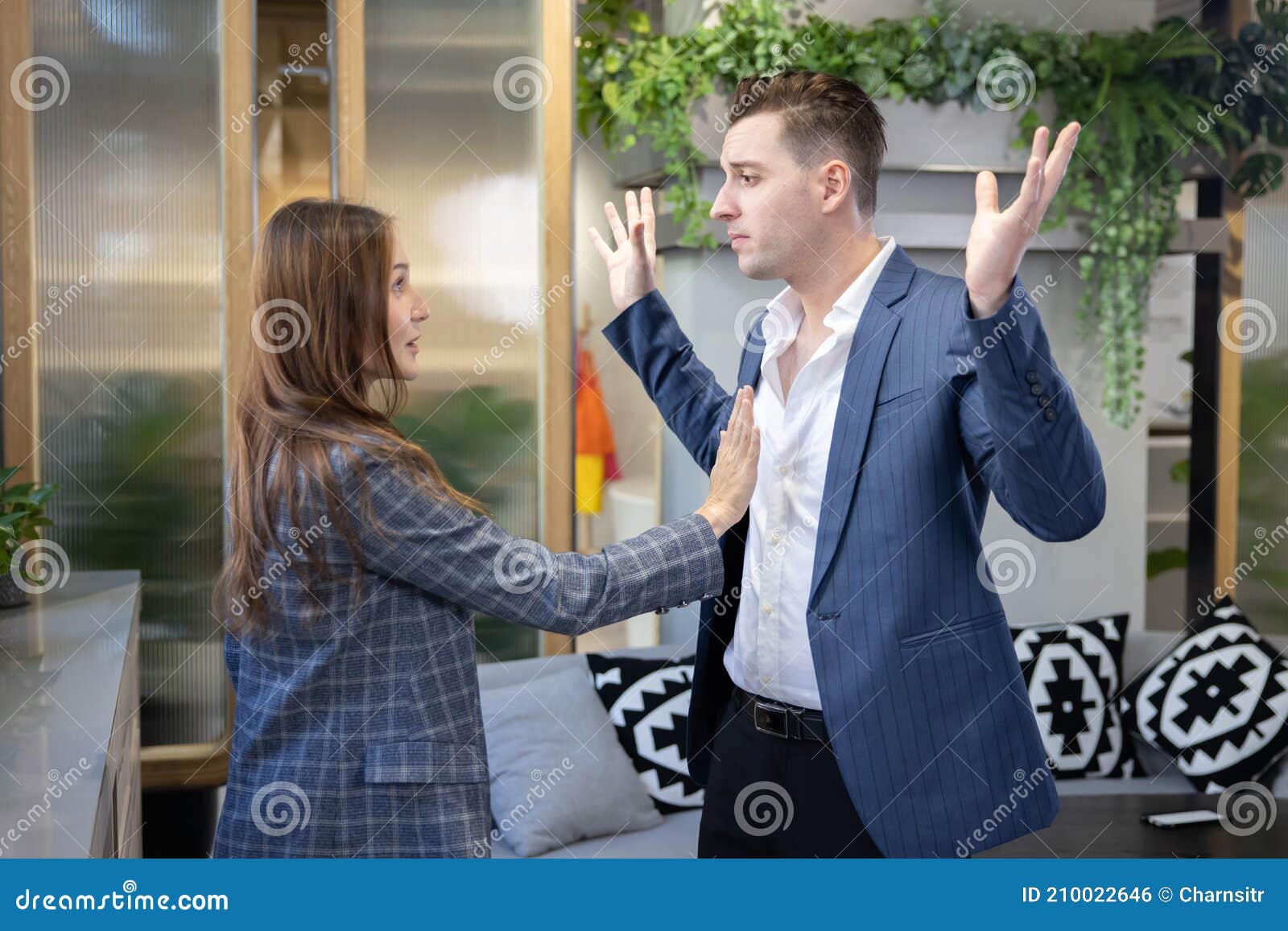caucasian man in suit have a quarrel with his wife or his collegue
