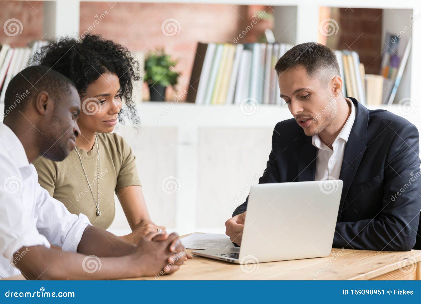 Caucasian Realtor Meeting With Clients Couple Show Houses At Laptop Stock Image Image Of 