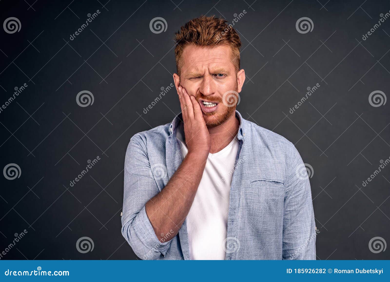 Photo of Caucasian Redhaired Man Suffers Painful Toothache, Has Rotten ...
