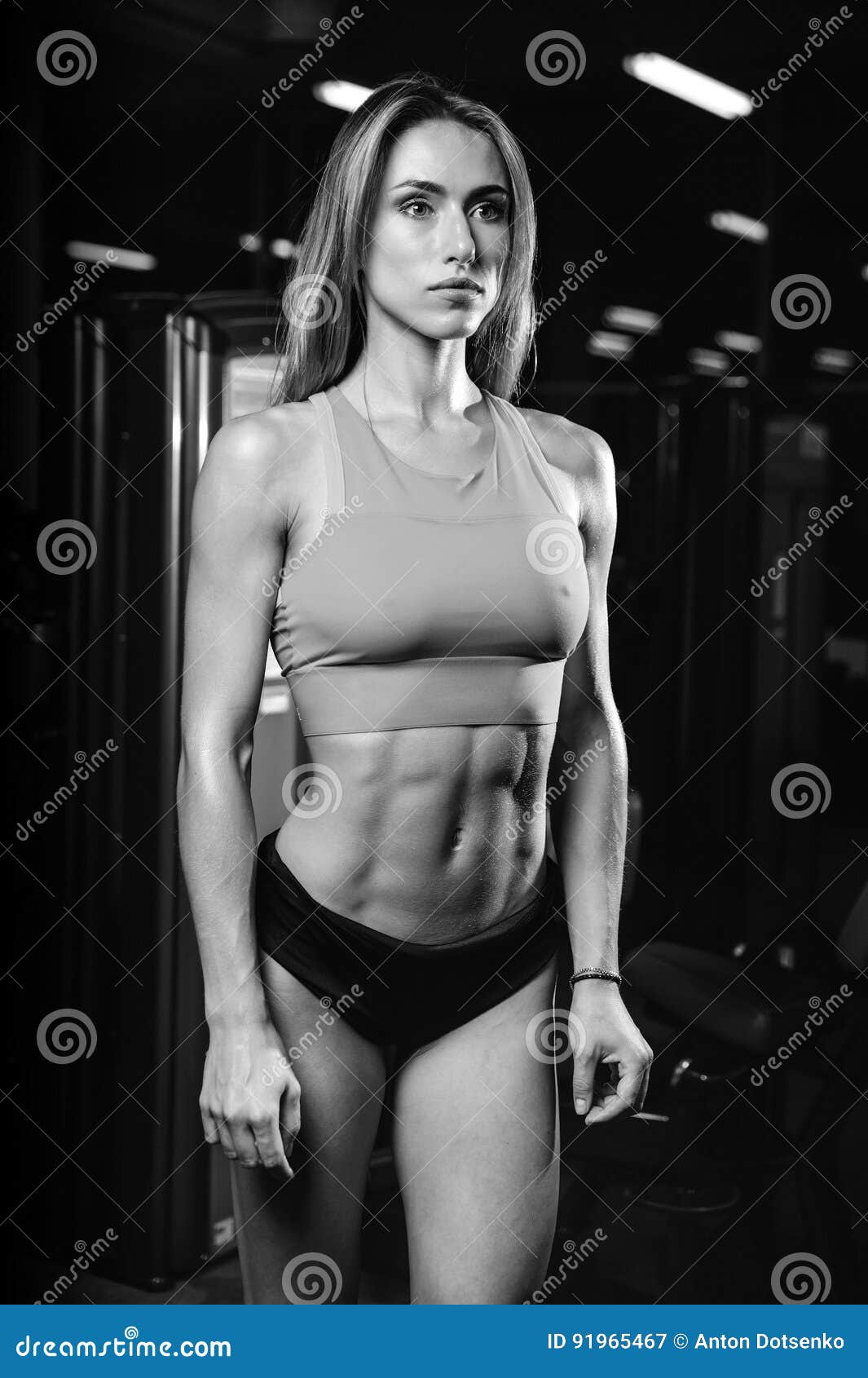 Caucasian Fitness Female Model in Gym Close Up Abs Stock Image