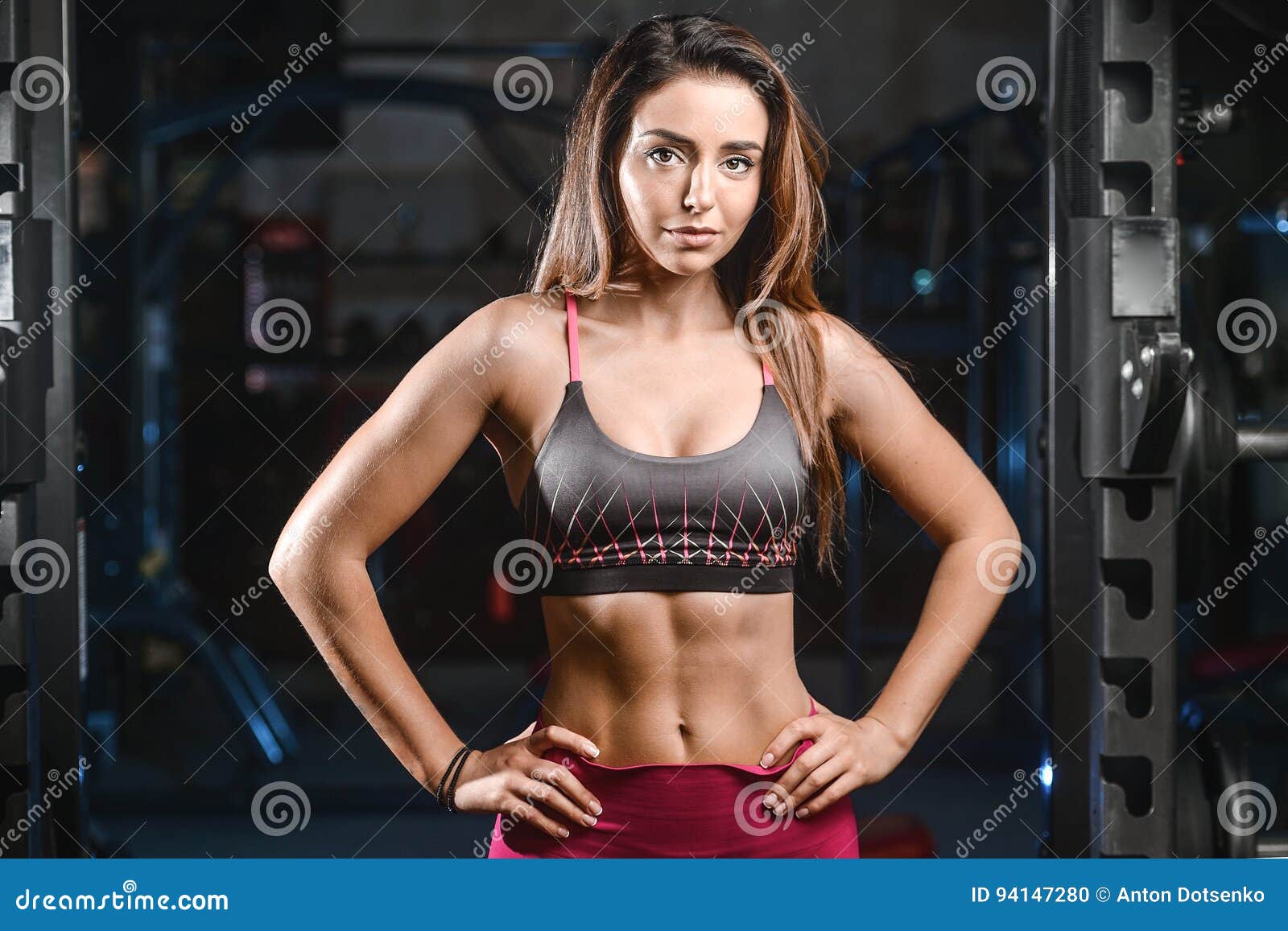 Caucasian Fitness Female Model in Gym Close Up Abs Stock Photo