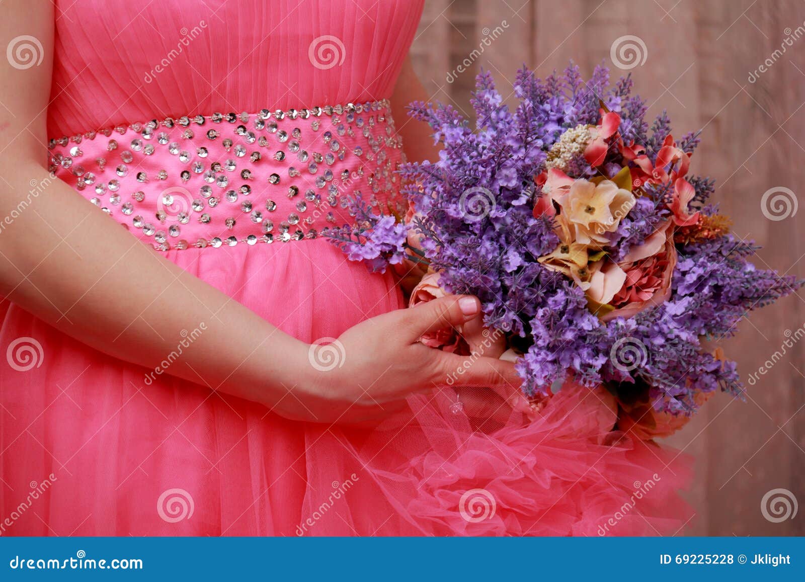 Caucasian Woman in Beige Wedding Dress Hold a Bouquet of Pink an Stock ...