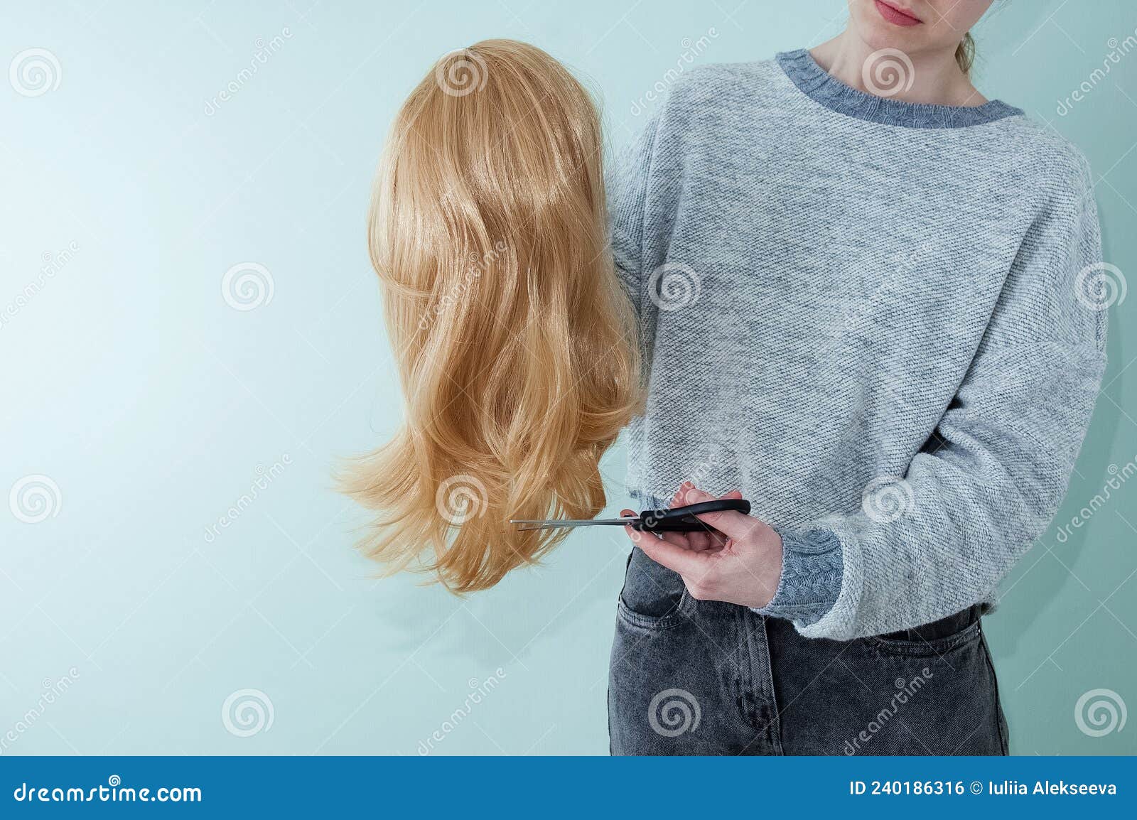 Caucasian Woman Cuts Blond Wig with Scissors Stock Photo - Image of beauty,  person: 240186316