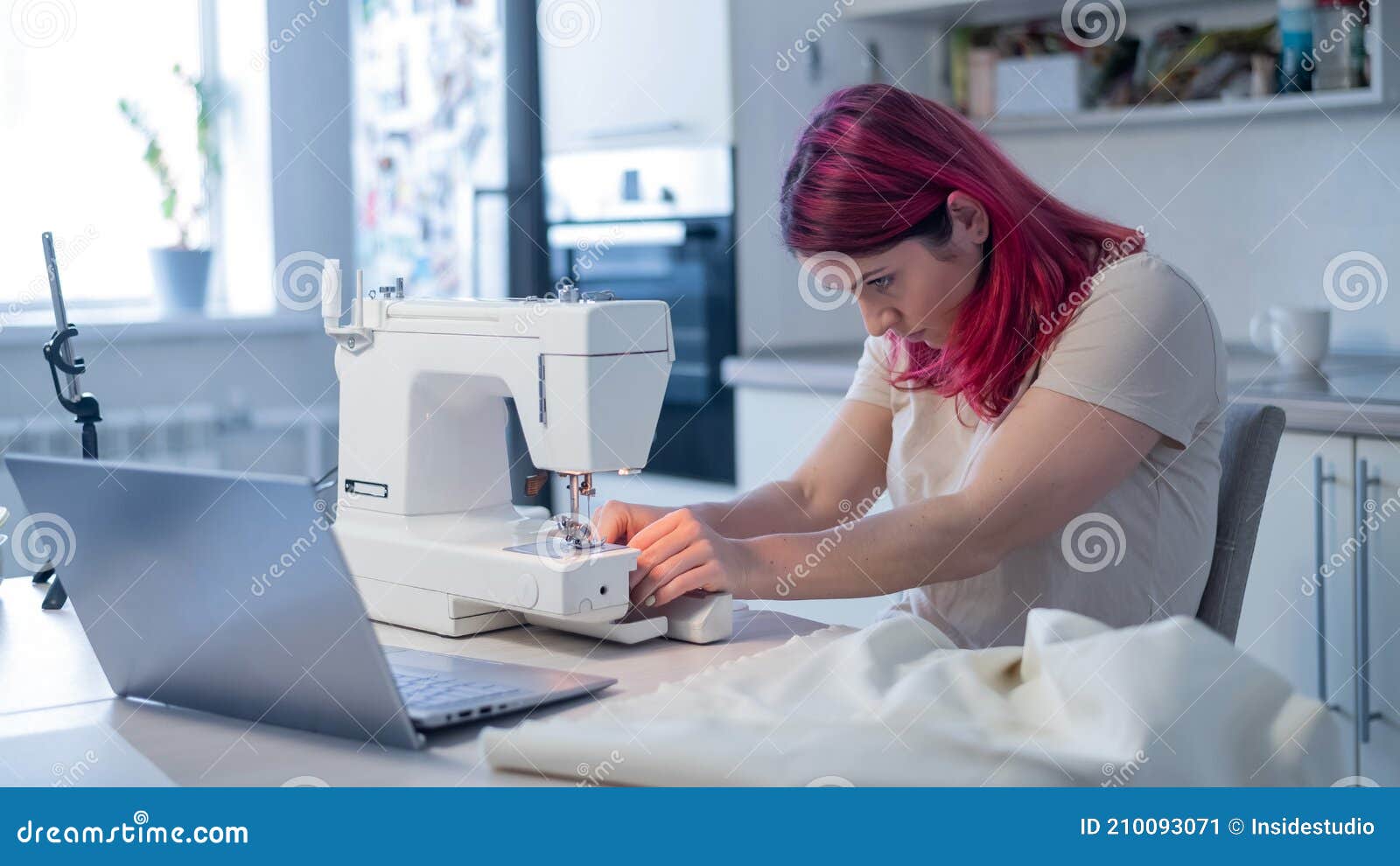 Caucasian Woman Learning To Sew from a Video Tutorial while Sitting in the  Kitchen. Home Hobby for an Online Lesson Stock Image - Image of handmade,  needle: 210093071