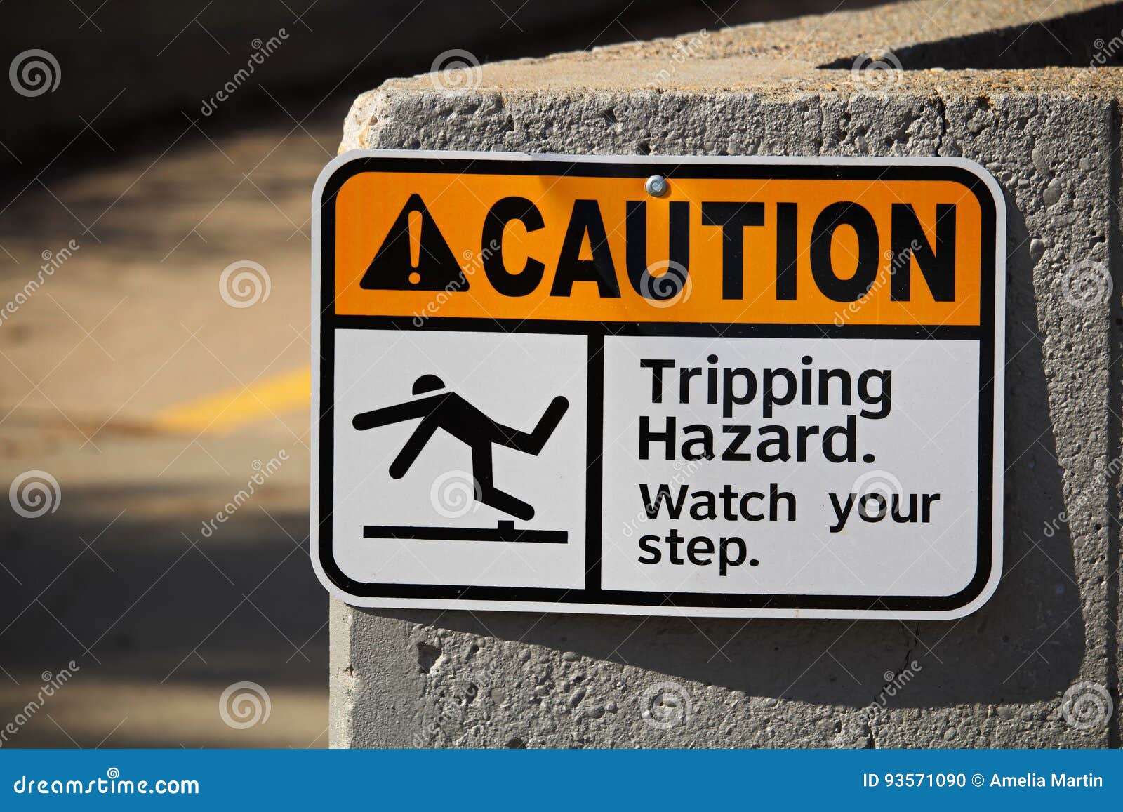 caution tripping hazard sign on a wall