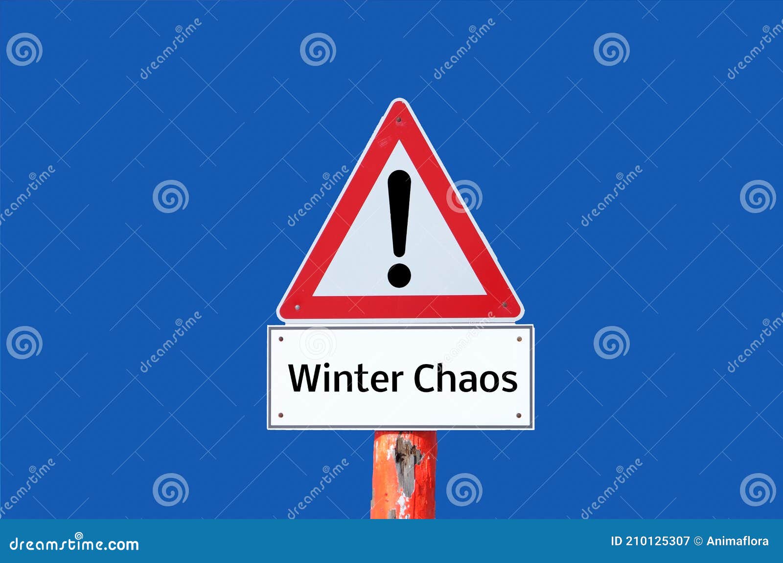 Caution Winter Chaos Warning Sign on Blue Background Stock Image