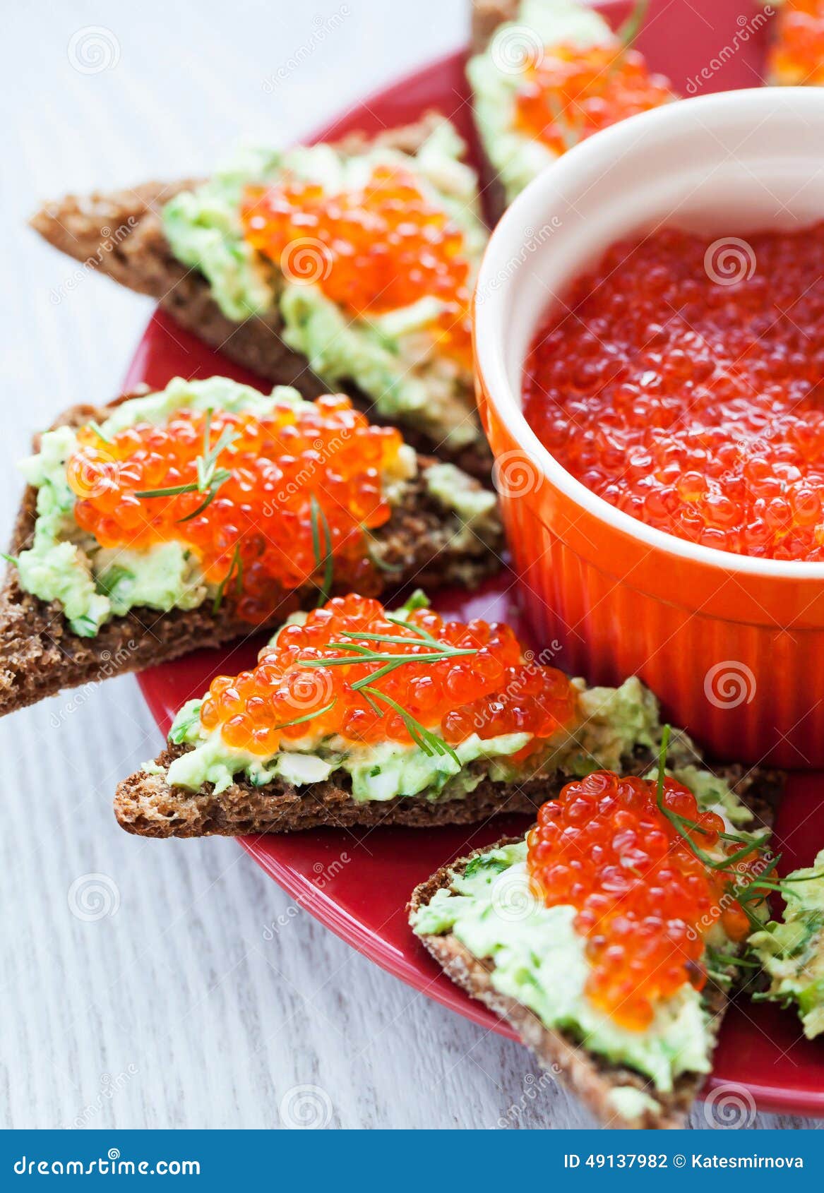 Caviar and avocado toasts stock photo. Image of green 49137982