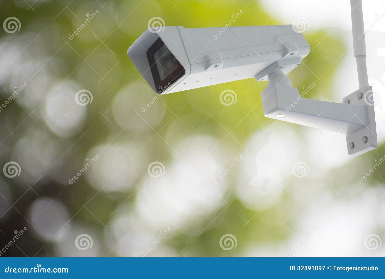 Cctv Camera with Green Blur Background Stock Image - Image of green