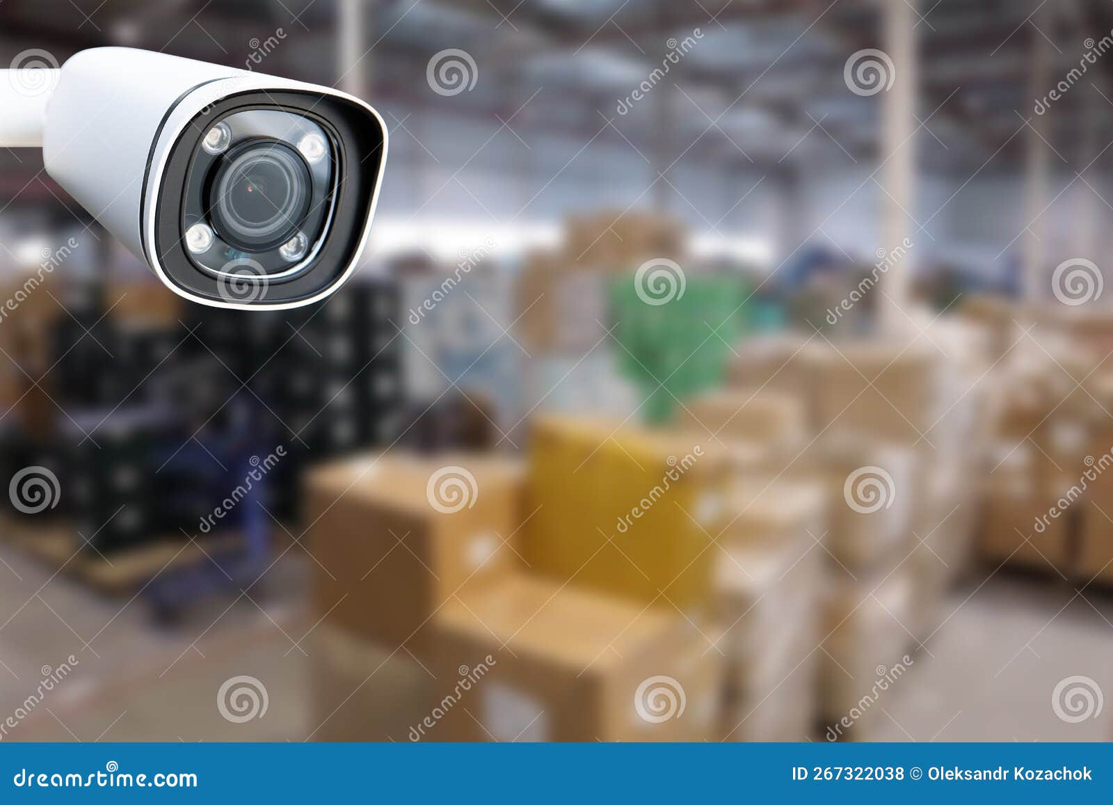 CCTV Camera Operating Inside Warehouse or Factory. Stock Photo Image
