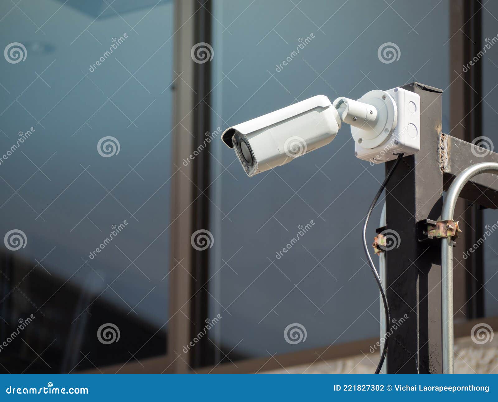 CCTV Camera Security on the Pole in the Car Parking Stock Photo Image