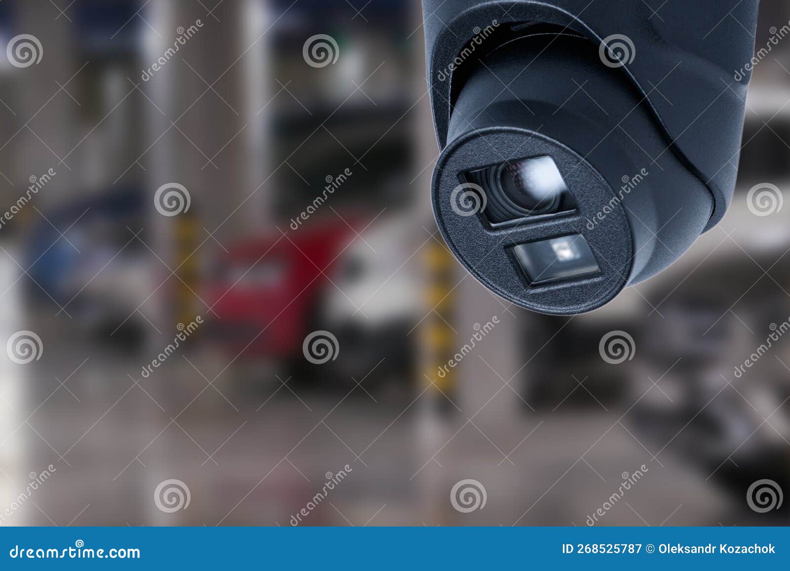 CCTV Camera in Underground Parking Garage. Copy Space. Stock Image