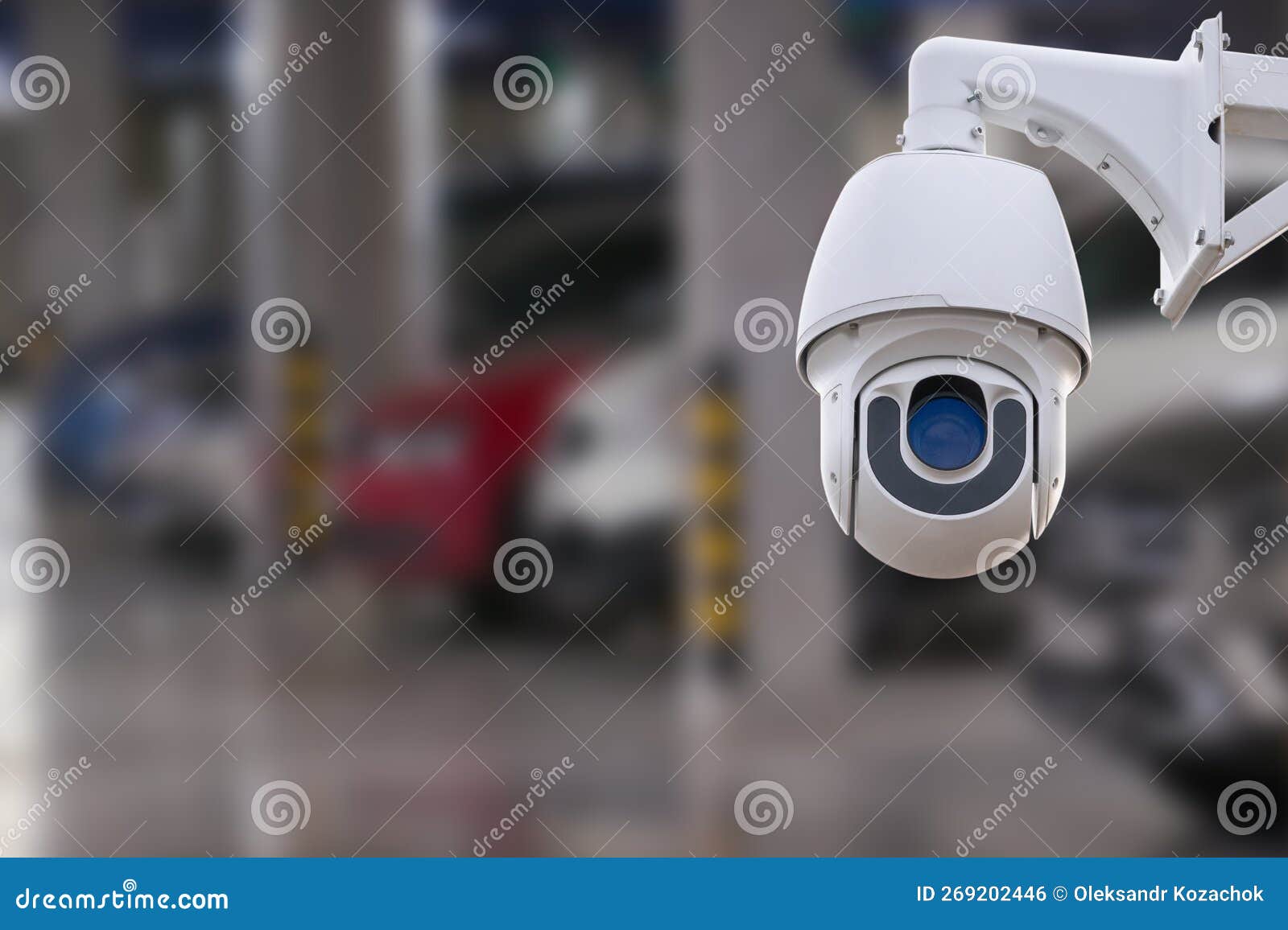 CCTV Camera in Underground Parking Garage. Copy Space. Stock Photo