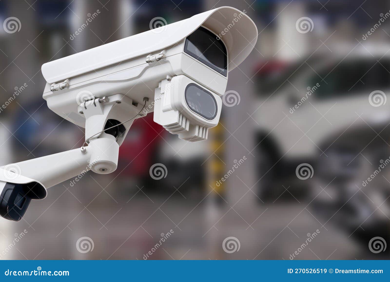 CCTV Camera in Underground Parking Garage. Copy Space. Stock Image