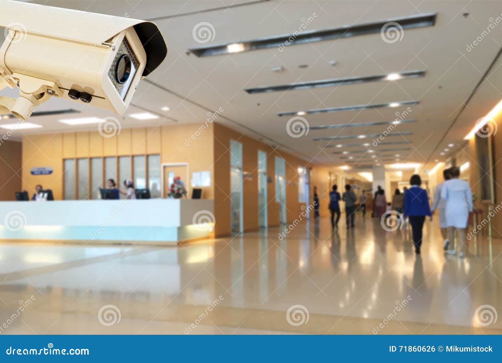 CCTV Security Camera Operating in Hospital Blur Background Stock Photo