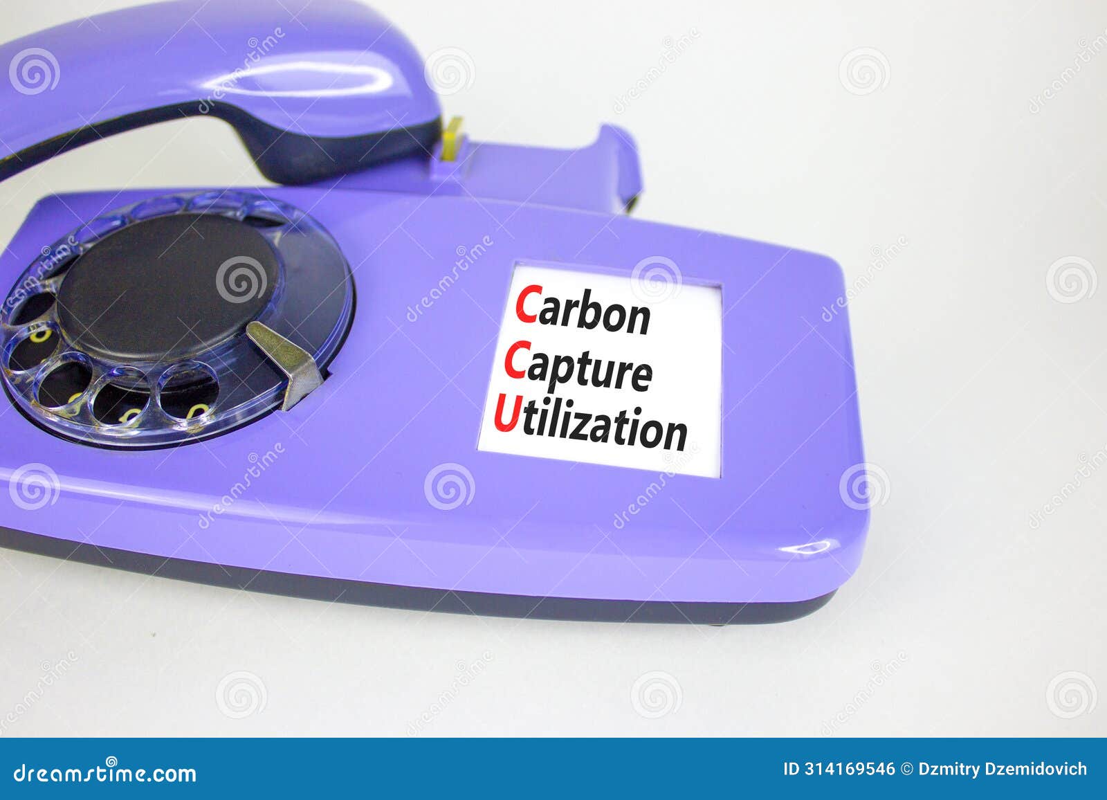 ccu carbon capture utilization . concept words ccu carbon capture utilization on old disk phone. beautiful white background