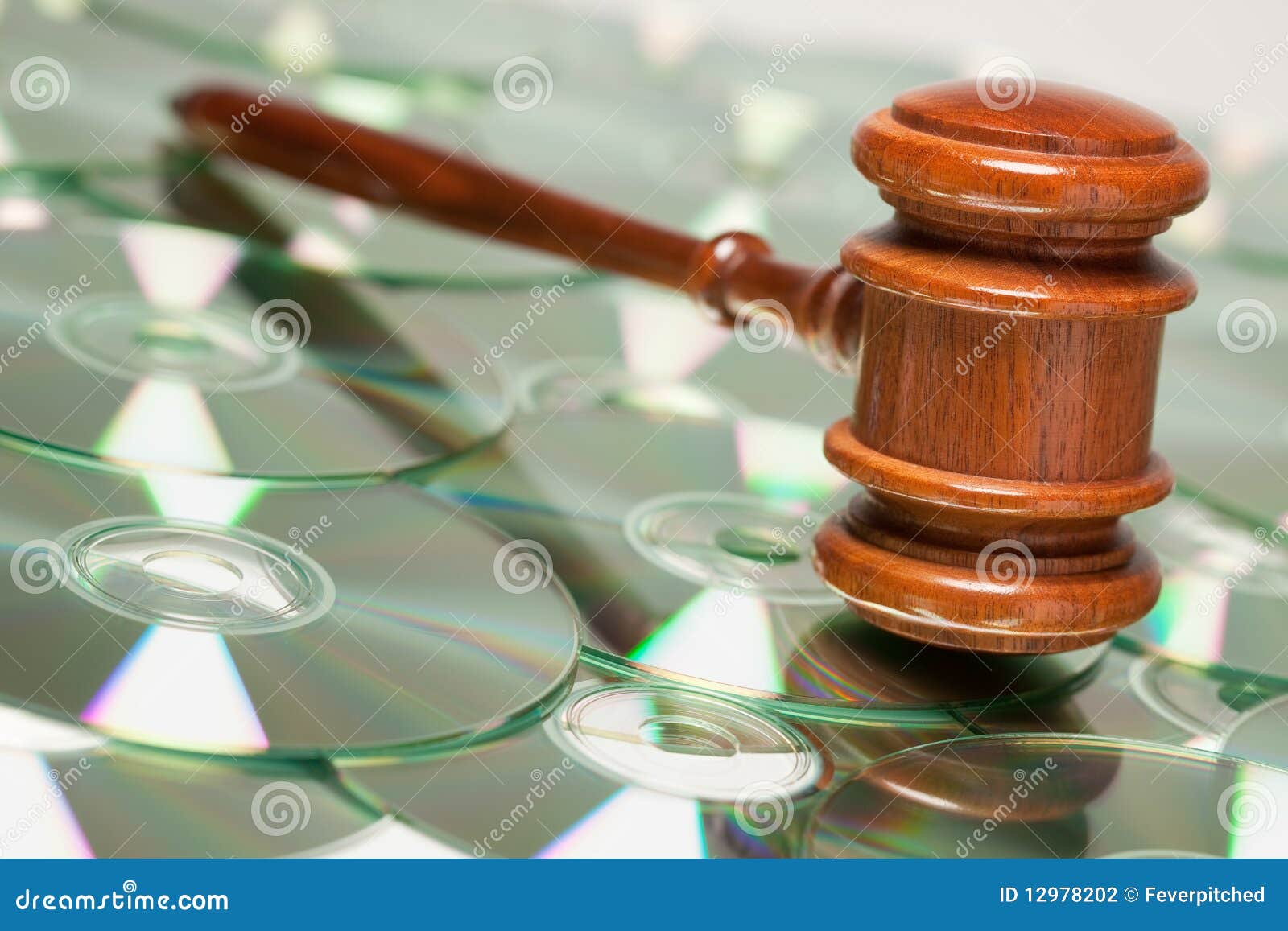 cd rom or dvd discs and gavel