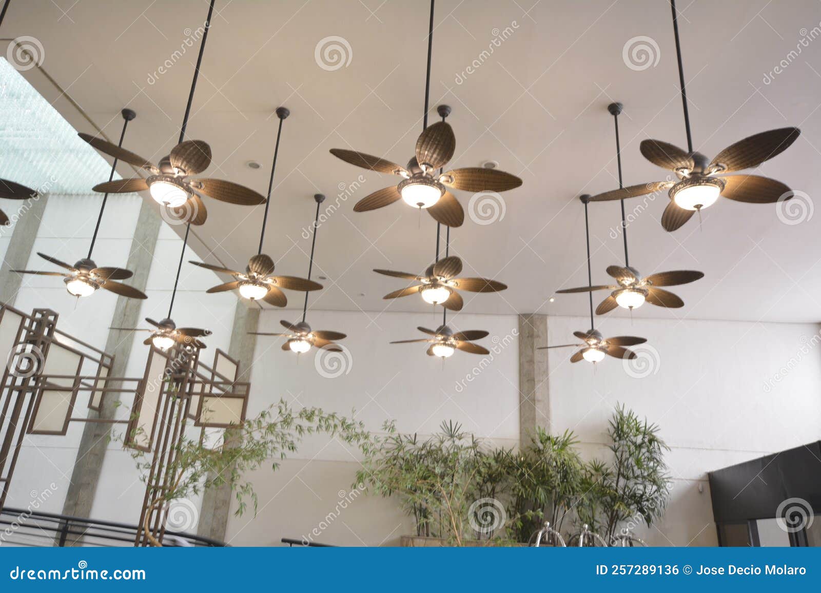 ceiling fans, colonial style with lights on in a luxury resort in the background decorations a