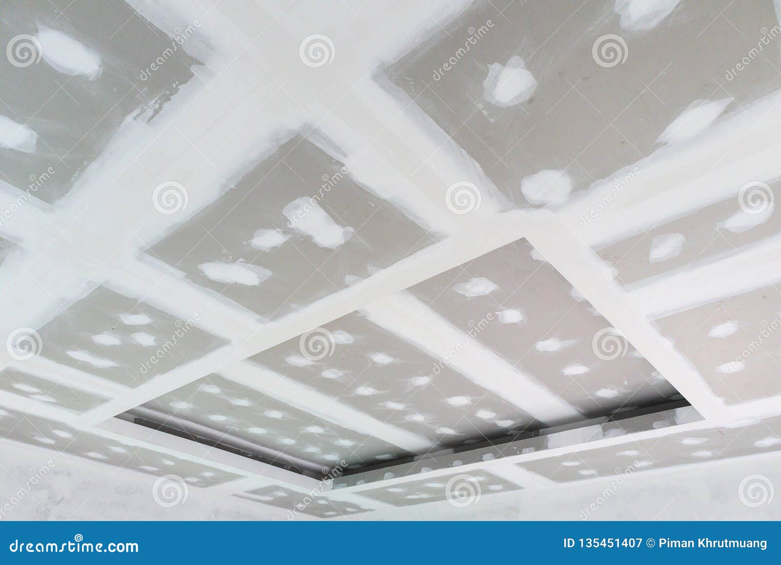 Ceiling Gypsum Board Installation At Construction Site Stock