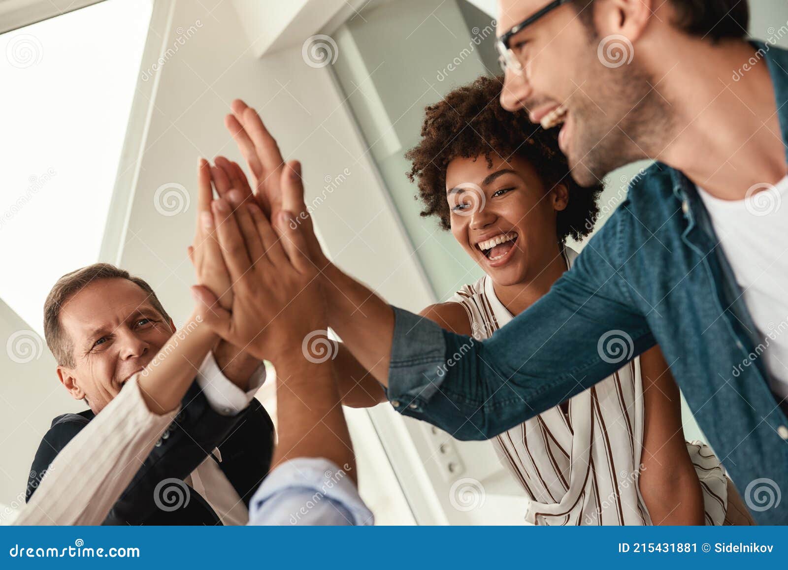 Celebrating Success Business People Giving Each Other High Five And