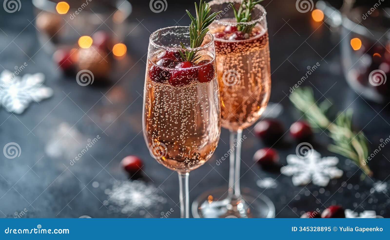 celebration drinks with cranberries and rosemary in an elegant holiday setting