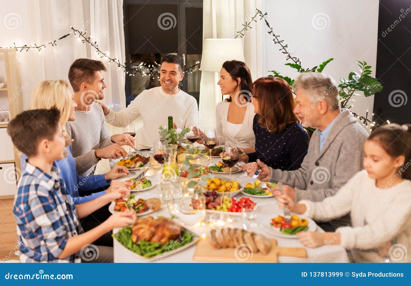 Happy Family Having Dinner Party at Home Stock Image - Image of