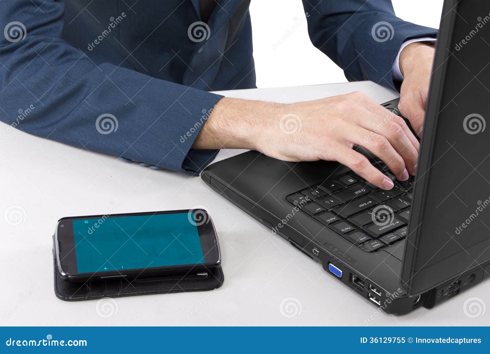 Cell Phone on Desk. Cellphone on desk with blank screen for composites