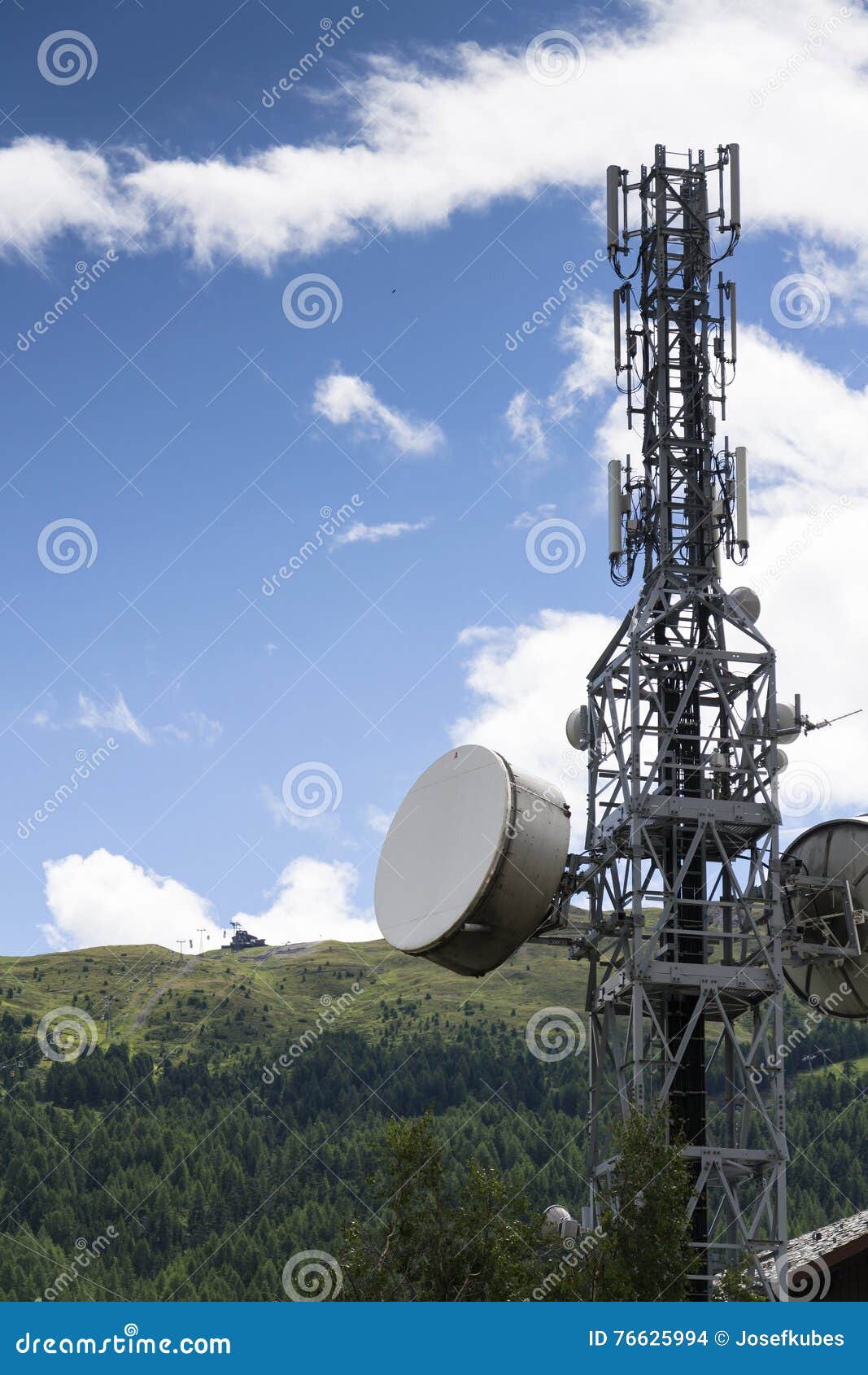 Cell Phone Transmitters on Tower in Mountains Stock