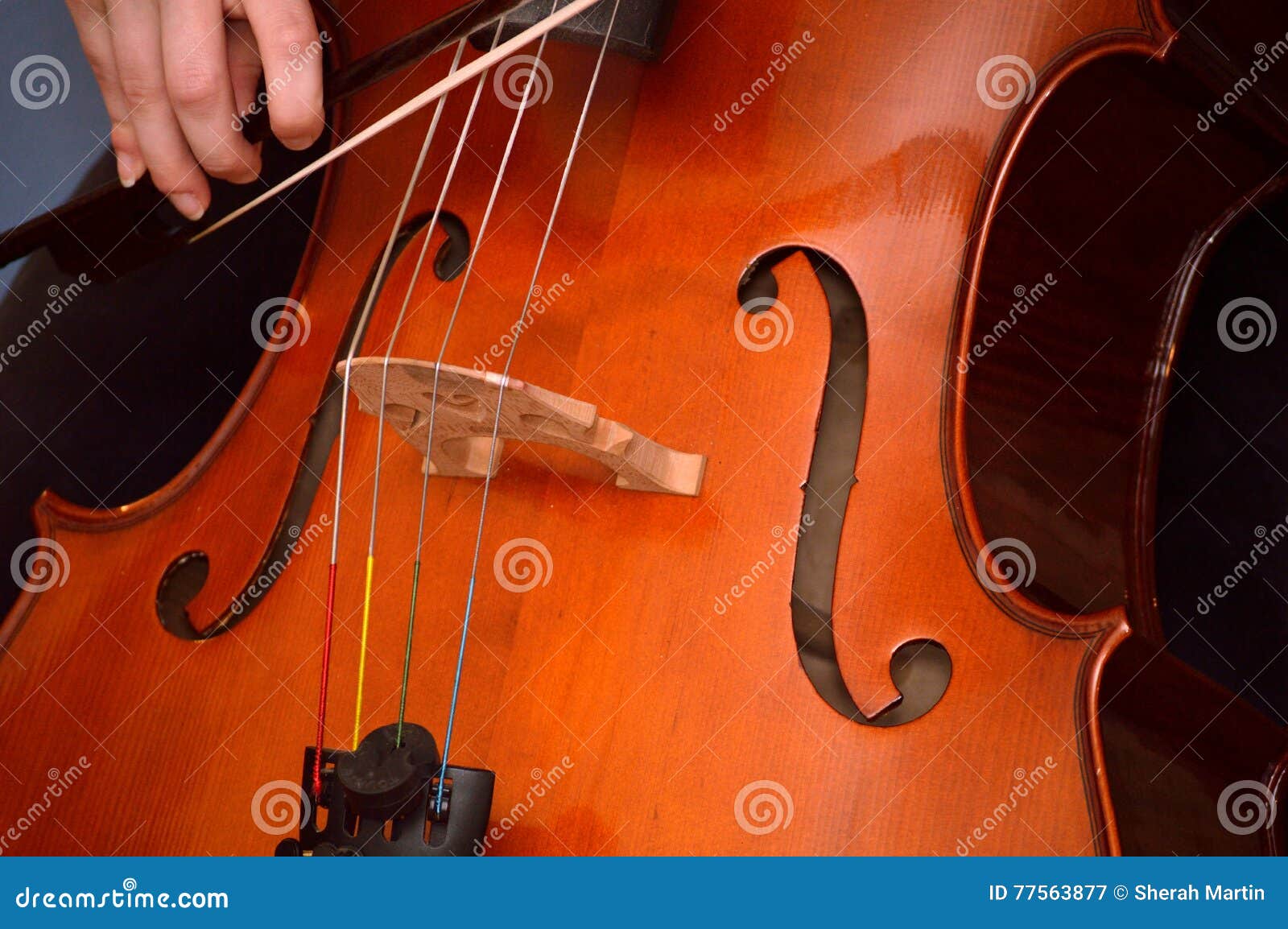 cellist playing cello
