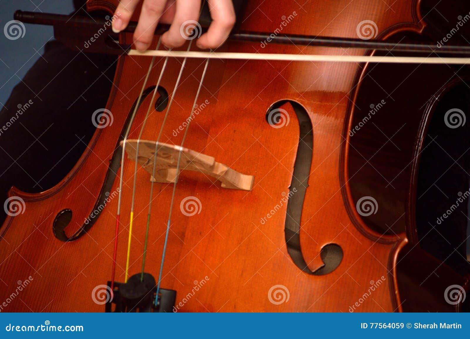 cellist playing cello