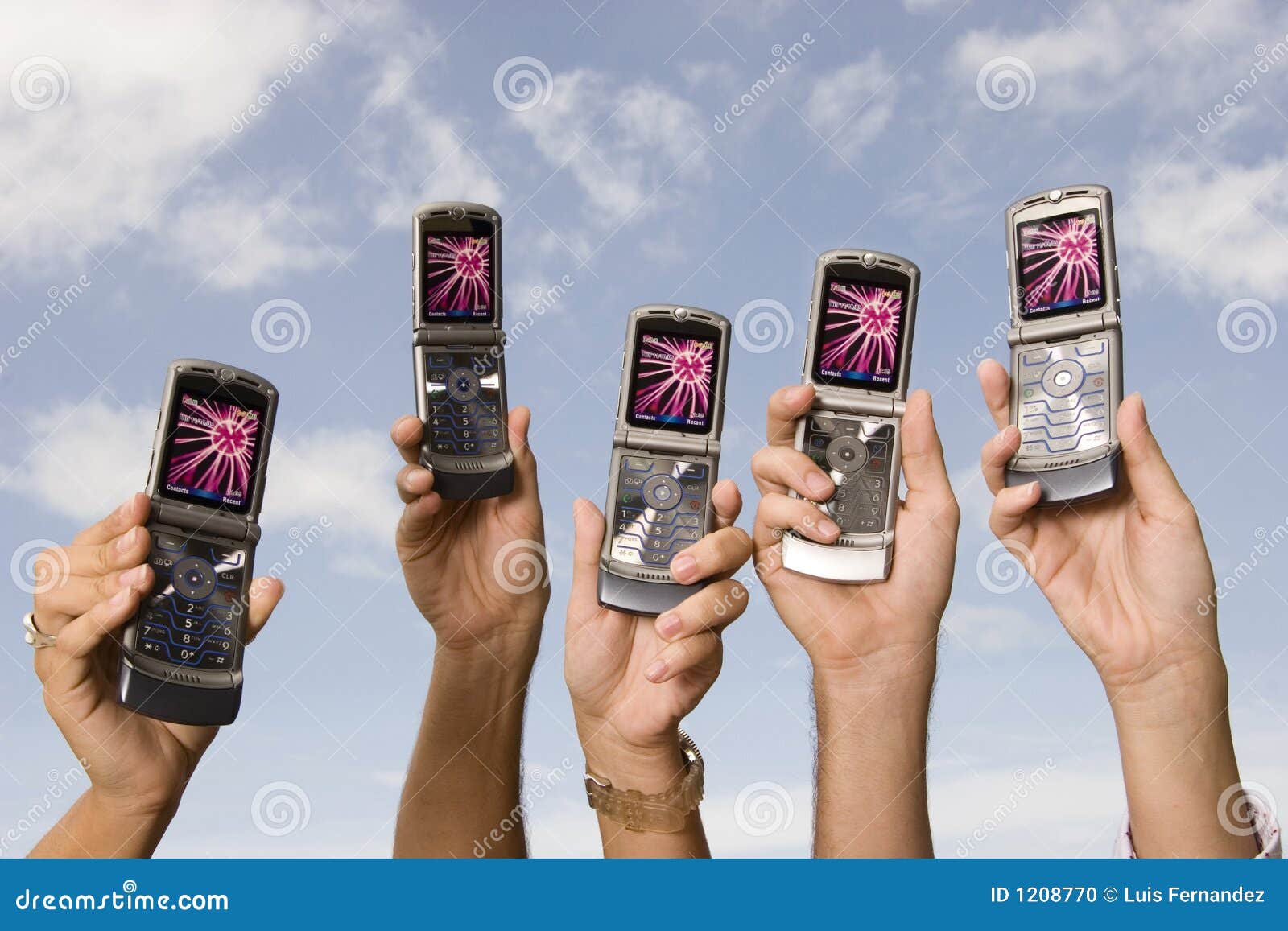Cellphones in the air stock photo. Image of hands, display 1208770