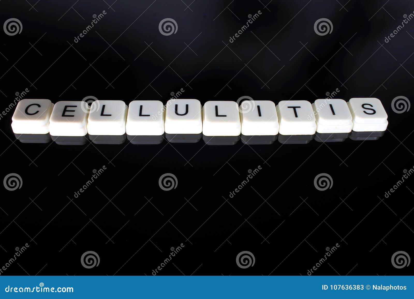 cellulitis text word title caption label cover backdrop background. alphabet letter toy blocks on black reflective