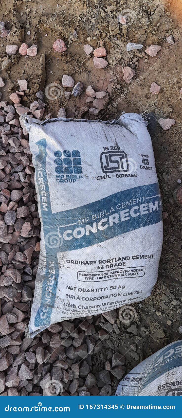 The volume of one bag of cement weighing 50 kg is: